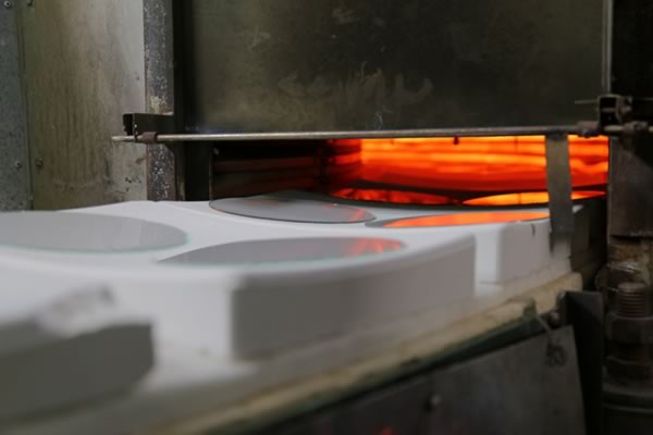 Glass tile adhesive curing